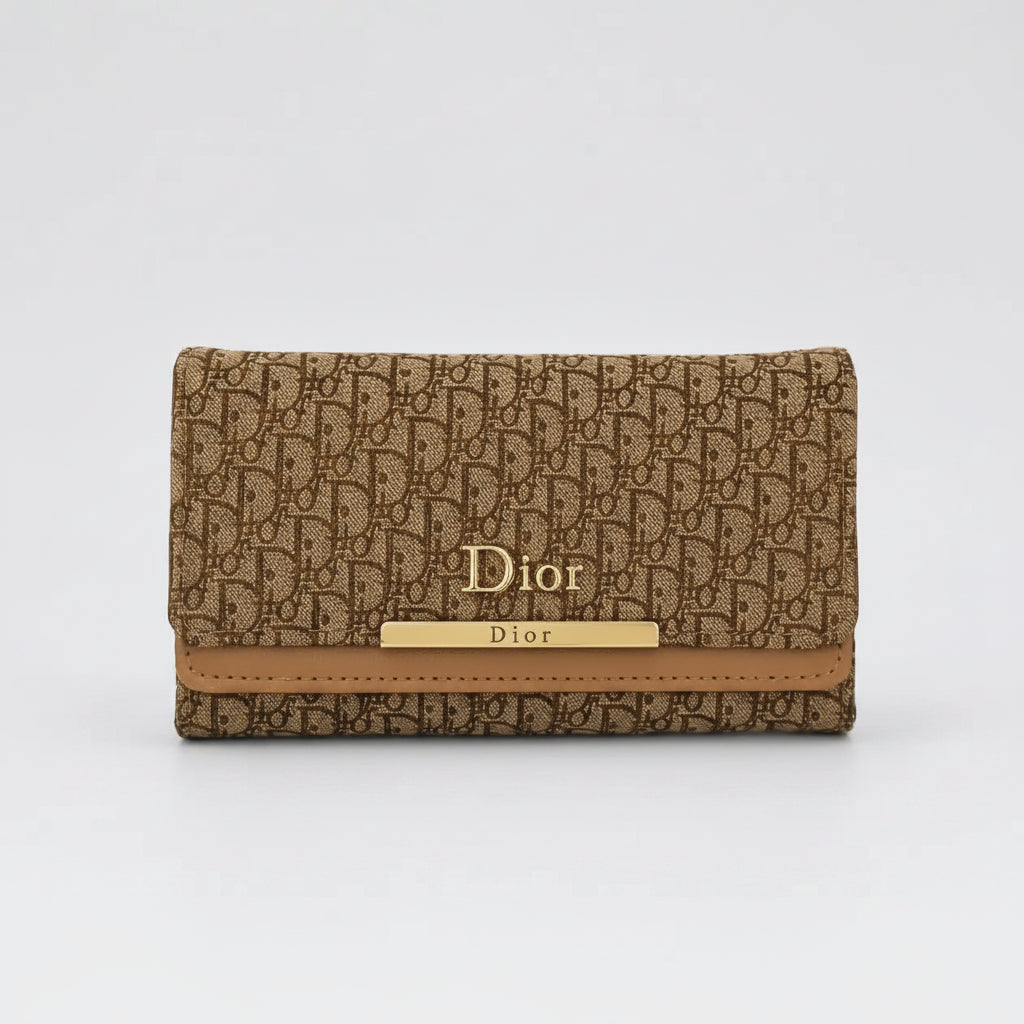 A Dior wallet in the brand's signature brown and beige Oblique monogram canvas, featuring a tan leather trim and a gold-tone metal bar with 'Dior' branding.
