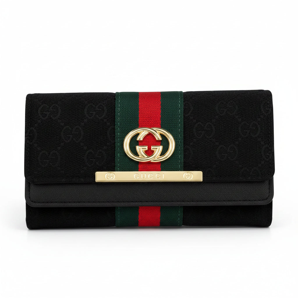 Gucci black wallet with GG Supreme canvas, green and red web stripe, gold-tone interlocking G logo, and a gold-tone GUCCI bar on a white background.