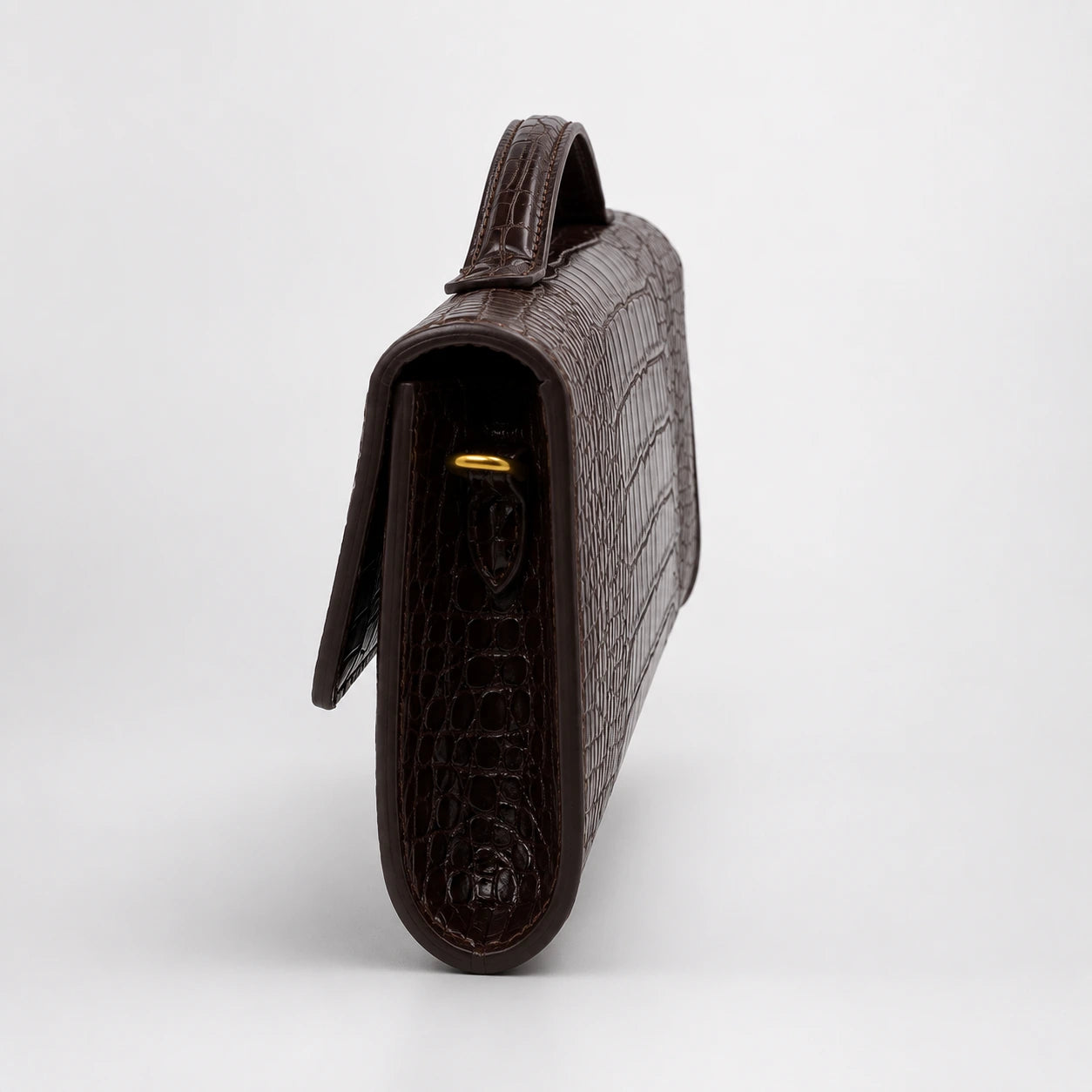 Croc Embossed Top Handle Clutch in Coffee