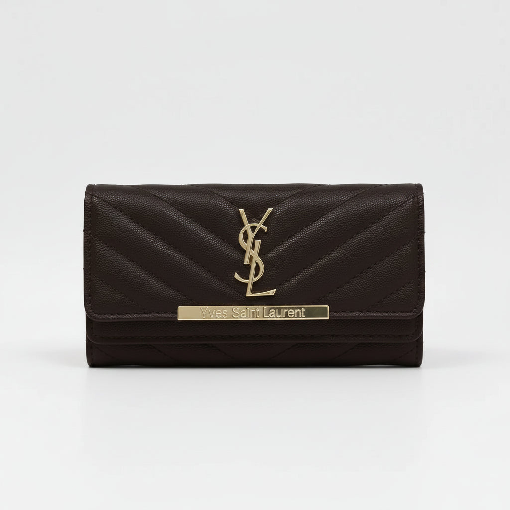 A dark brown quilted leather wallet by Yves Saint Laurent, featuring a gold-tone metal YSL logo and brand plaque on the front flap, set against a plain light gray background.