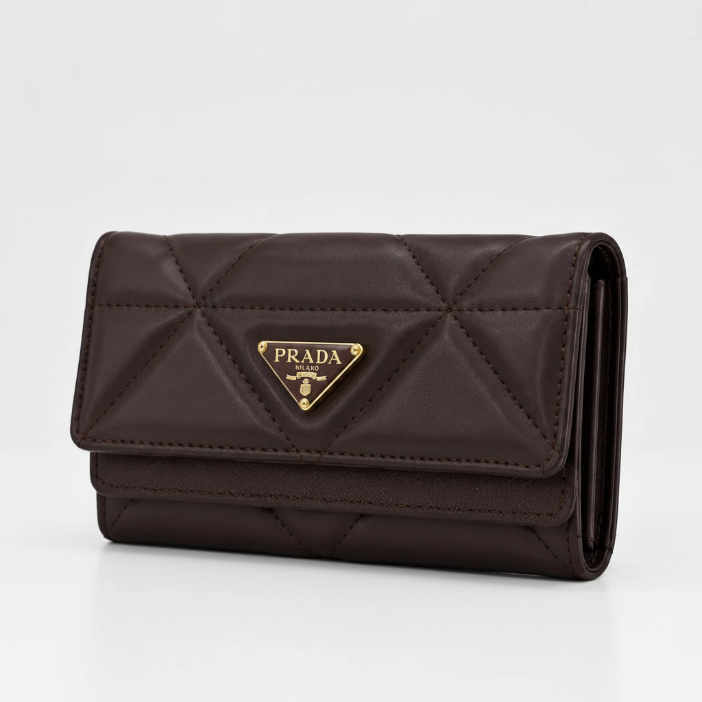 A dark brown Prada quilted leather wallet with a gold-tone triangular logo plaque on the front, set against a plain white background.
