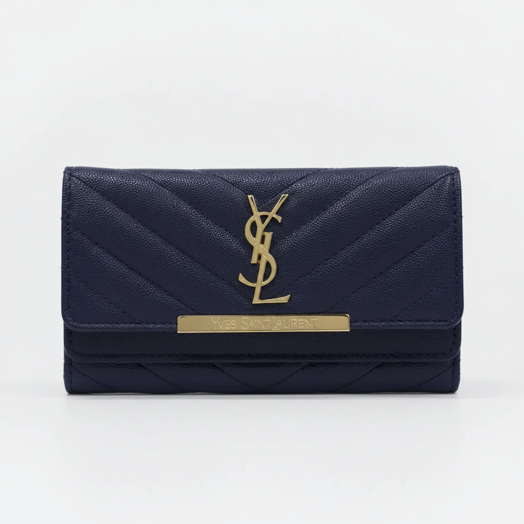 A navy blue quilted leather wallet with a gold-tone YSL monogram and a gold bar accent on the front, set against a plain white background.