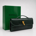 Croc Embossed Top Handle Clutch in Coffee