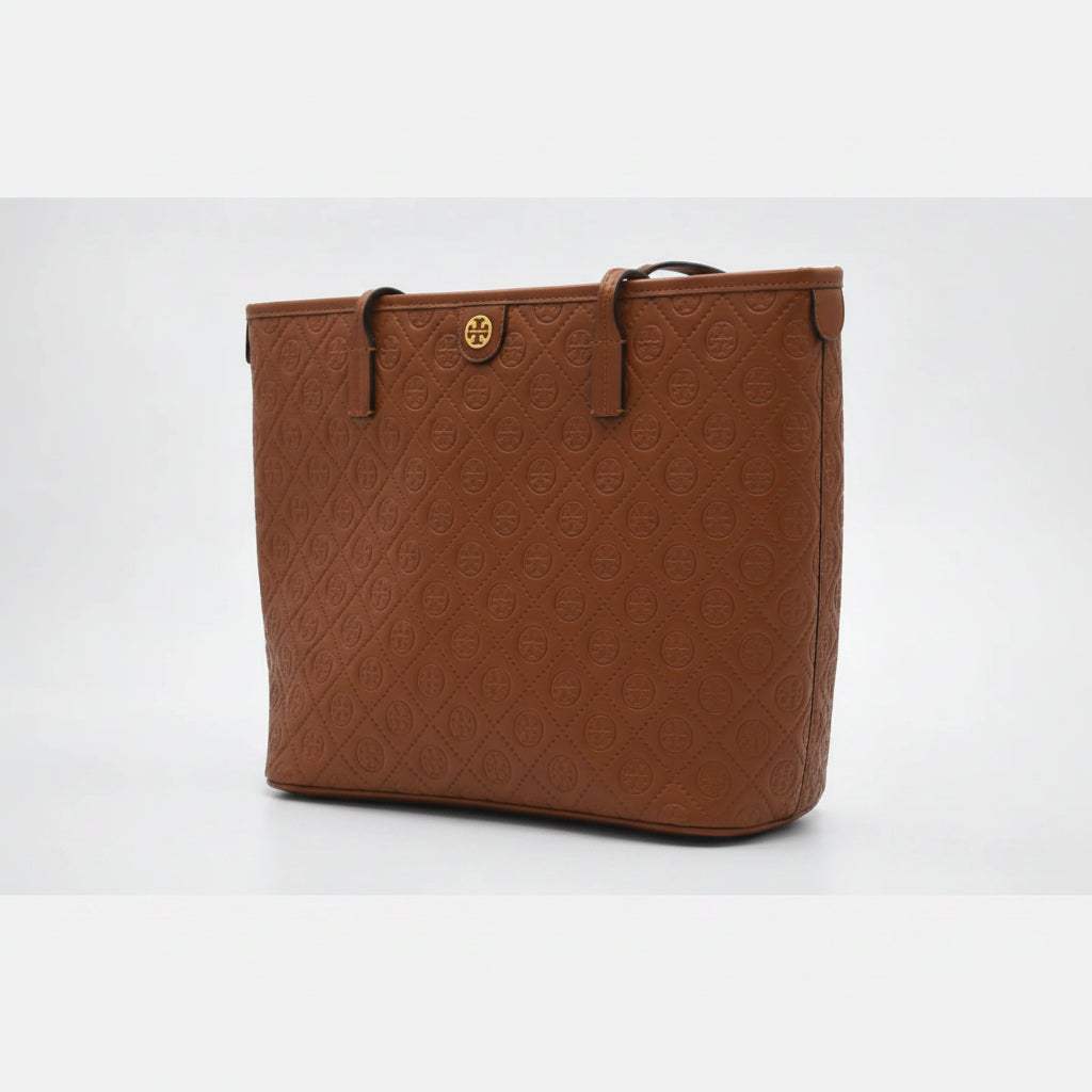 Brown embossed leather tote bag with gold logo detail